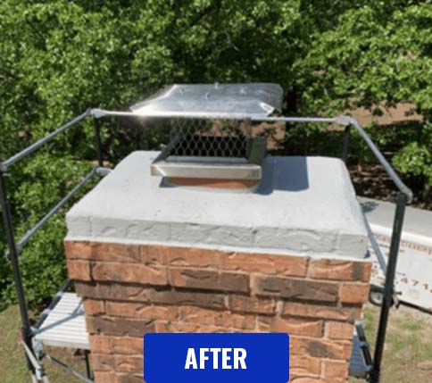 Stock photo of chimney crown after completion - C and C Chimney Chimney crown after replacement - scaffolding still in place - background full of trees cap replaced