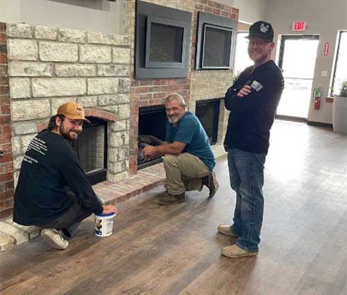 Technicians with Fireplace Technicians with Fireplace